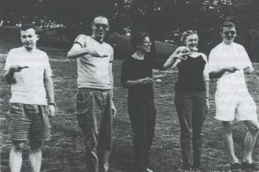 Five participants in an egg-and-spoon race in Greenwich Park at a Metro Centre event, 1998