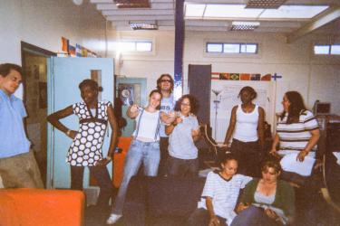 Young people talking and posing with their youth group at The Metro Centre