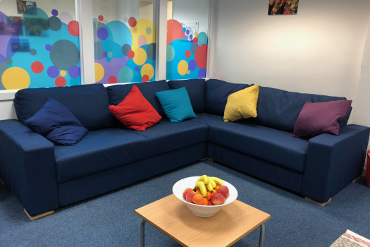 METRO Woolwich breakout room with a bowl of fruit in front of the sofa